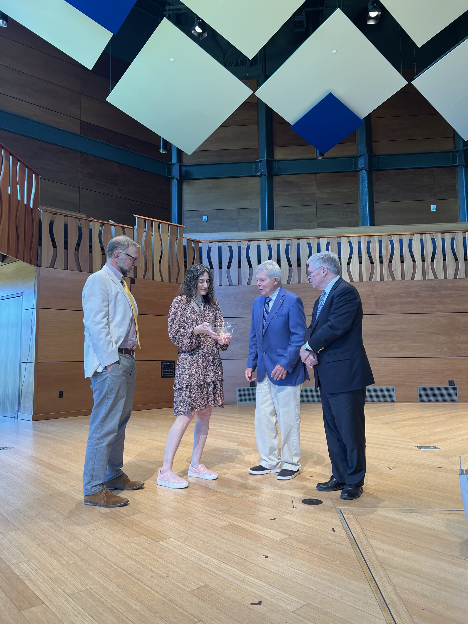 Photo of my husband, my Head of School, and the generous donor Dan Lufkin right after I accepted the Lufkin Award